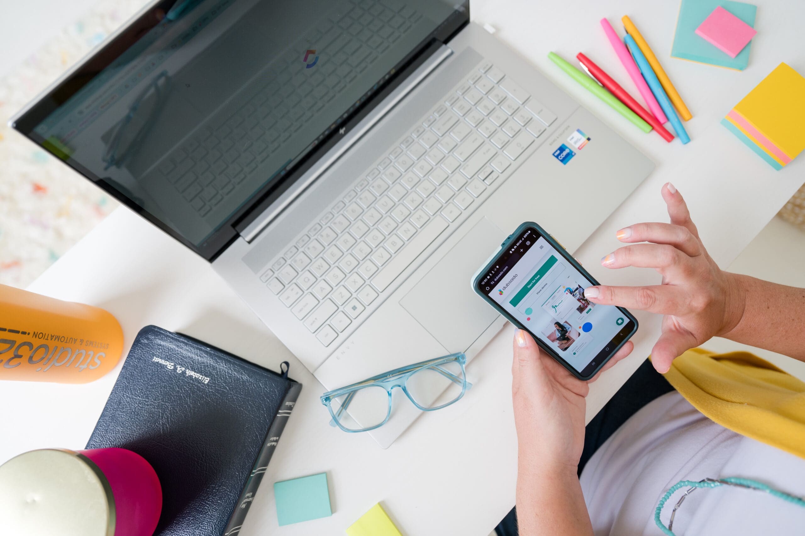 Streamlined workspace with Dubsado mobile app, Studio320 branding, and productivity tools for small business automation.